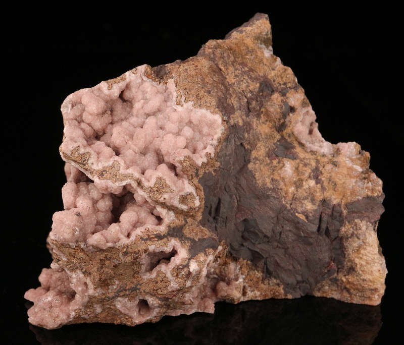 Rhodochrosite on Matrix, N'Chwaning III Mine, Kalahari Manganese Field, Northern Cape, South Africa.