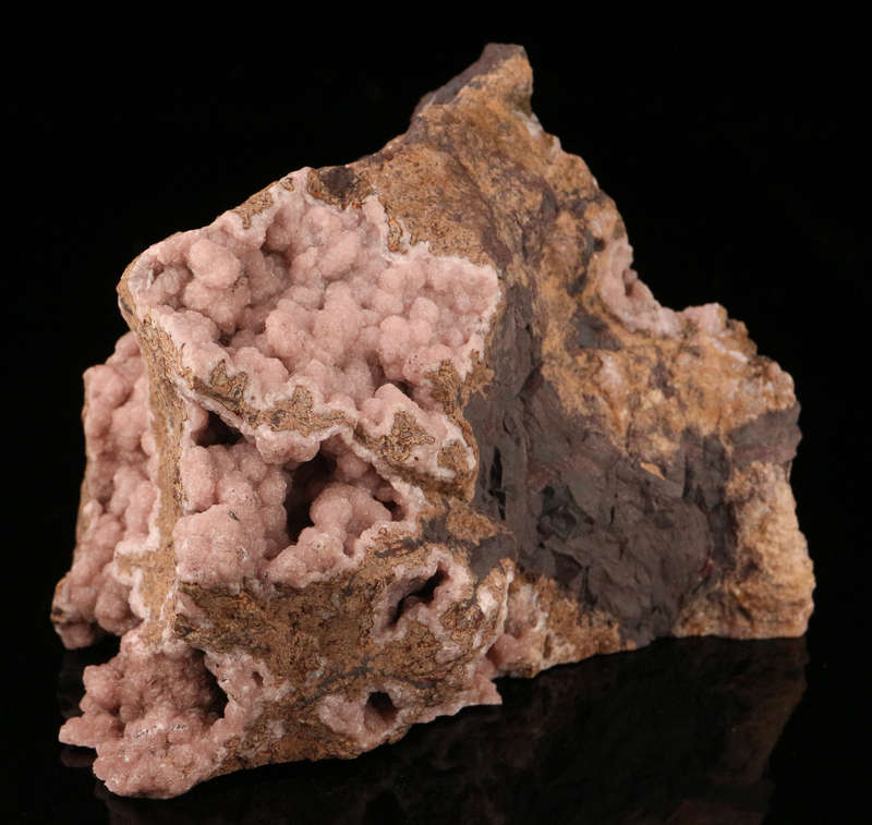 Rhodochrosite on Matrix, N'Chwaning III Mine, Kalahari Manganese Field, Northern Cape, South Africa.