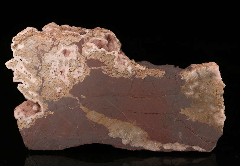 Rhodochrosite on Matrix, N'Chwaning III Mine, Kalahari Manganese Field, Northern Cape, South Africa.