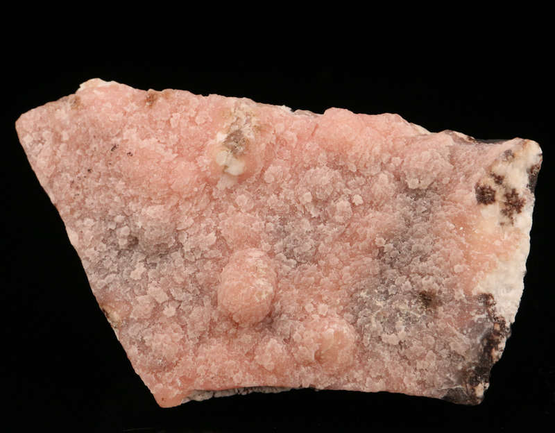 Rhodochrosite on Matrix, N'Chwaning II Mine, Kalahari Manganese Field, Northern Cape, South Africa.