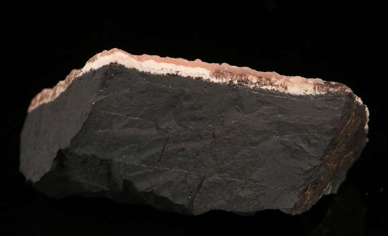 Rhodochrosite on Matrix, N'Chwaning II Mine, Kalahari Manganese Field, Northern Cape, South Africa.
