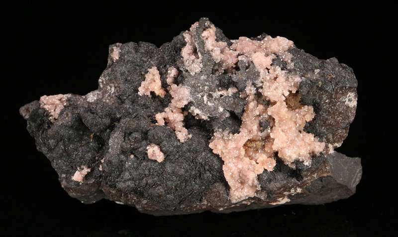 Rhodochrosite on Matrix,"N'Chwaning II Mine, Kalahari Manganese Field, Northern Cape, South Africa.