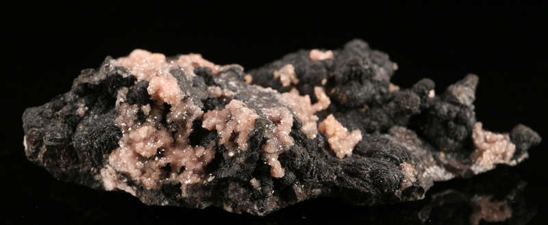 Rhodochrosite on Matrix,"N'Chwaning II Mine, Kalahari Manganese Field, Northern Cape, South Africa.