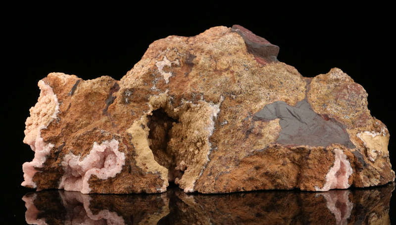 Rhodochrosite on Matrix,"N'Chwaning II Mine, Kalahari Manganese Field, Northern Cape, South Africa.