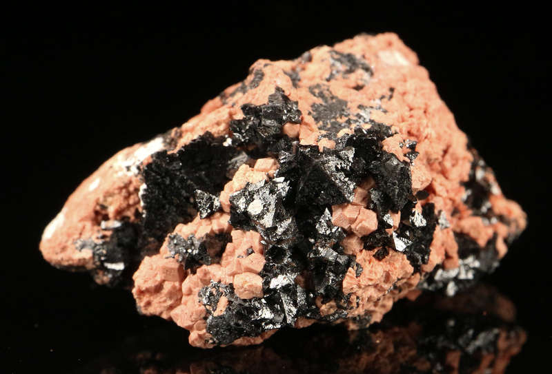 Hausmannite on Andradite,"N'Chwaning II Mine, Kalahari Manganese Field, Northern Cape, South Africa.