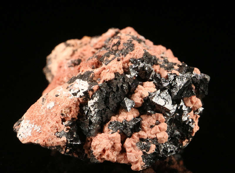 Hausmannite on Andradite,"N'Chwaning II Mine, Kalahari Manganese Field, Northern Cape, South Africa.