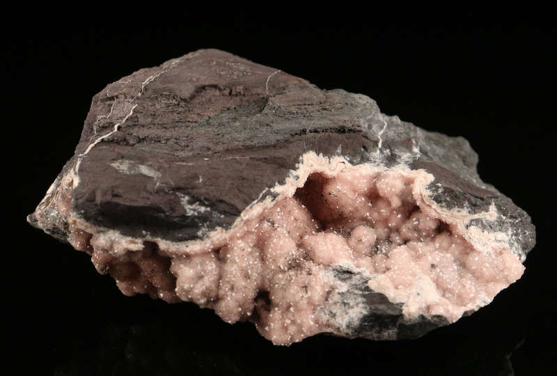 Rhodochrosite on Matrix,"N'Chwaning II Mine, Kalahari Manganese Field, Northern Cape, South Africa.