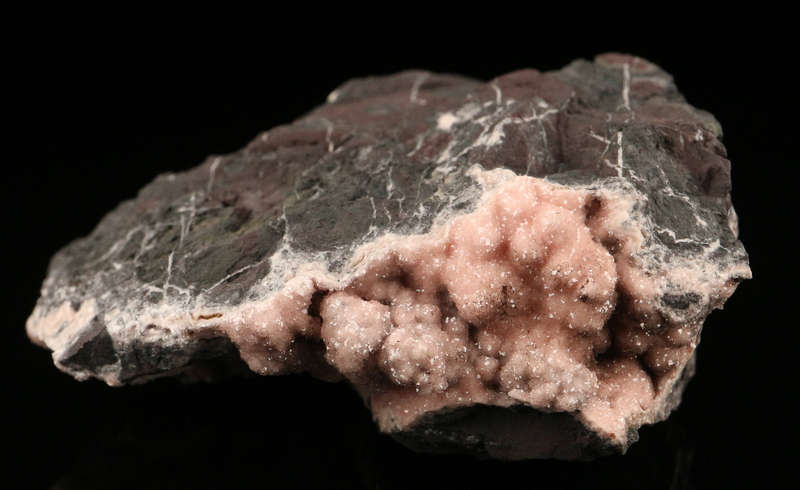 Rhodochrosite on Matrix,"N'Chwaning II Mine, Kalahari Manganese Field, Northern Cape, South Africa.