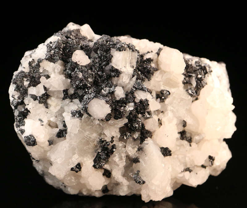 Calcite on Hausmannite, N'Chwaning II, Northern Cape, South Africa