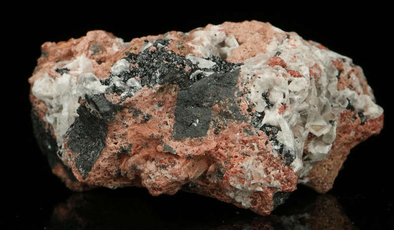 Hausmaniite and Andradite,"N'Chwaning II Mine, Kalahari Manganese Field, Northern Cape, South Africa
