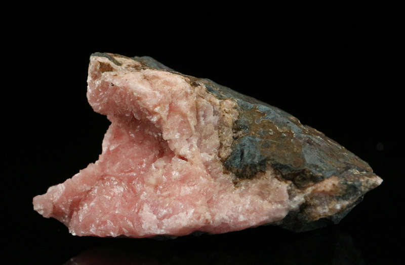 Rhodochrosite on Matrix,"N'Chwaning II Mine, Kalahari Manganese Field, Northern Cape, South Africa.