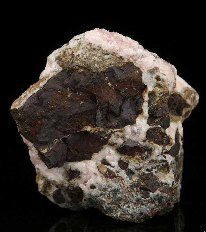 Rhodochrosite on Matrix,"N'Chwaning II Mine, Kalahari Manganese Field, Northern Cape, South Africa.