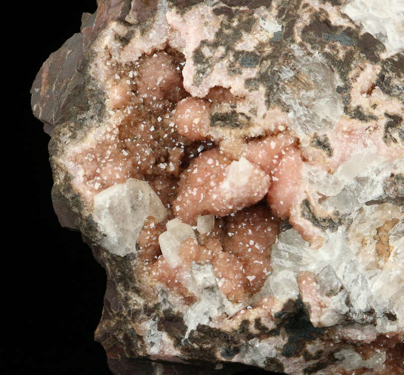 Rhodochrosite on Matrix,"N'Chwaning II Mine, Kalahari Manganese Field, Northern Cape, South Africa.