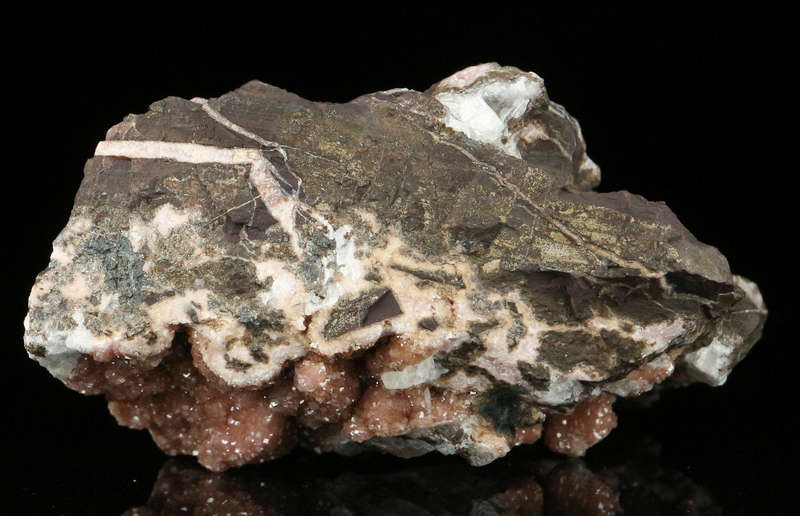 Rhodochrosite on Matrix,"N'Chwaning II Mine, Kalahari Manganese Field, Northern Cape, South Africa.