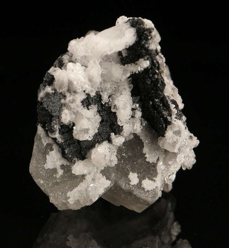 Calcite on Hausmannite, "N'Chwaning II Mine, Kalahari Manganese Field, Northern Cape, South Africa "