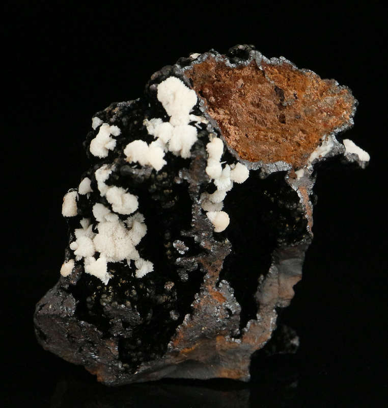 Calcite on Geothite , "N'Chwaning II Mine, Kalahari Manganese Field, Northern Cape, South Africa "