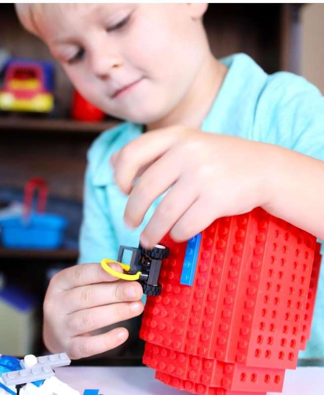 Lego cup with a few bricks to put on the cup