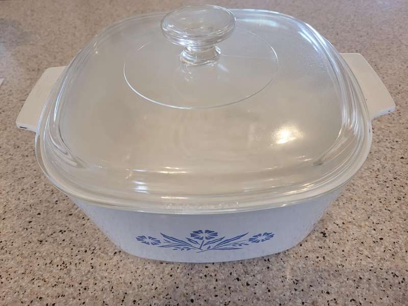CORNINGWARE CORNFLOWER FROM THE 1960'S TO THE 1990'S-THREE OVENWARE DISHES, TWO WITH LIDS.