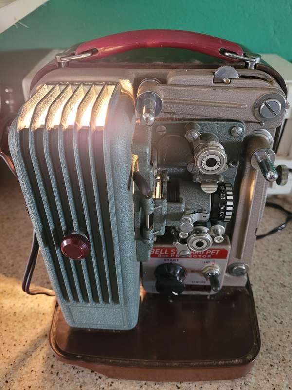 KEYSTONE 8MM MOVIE RECORDER CAMERA AND BELL AND KOON SYNCHRO PET PROJECTOR.
