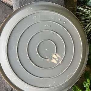 Set of 4 used plastic garden pot saucers for pot size 52 cm or smaller