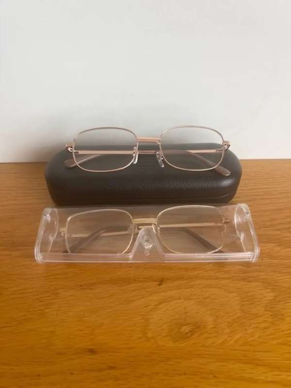 Set of 2 used general reading glasses