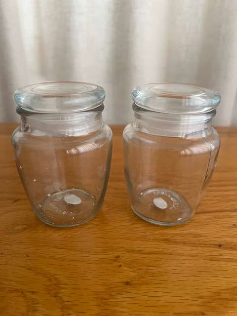 2 small glass jars for storage.  With lids.