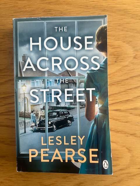 Book: Lesley Pearse.  The house across the street