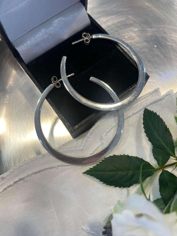 Beautiful Large Pair of Silpada Silver Hoop earrings 925 sterling silver. The studs as well!!
