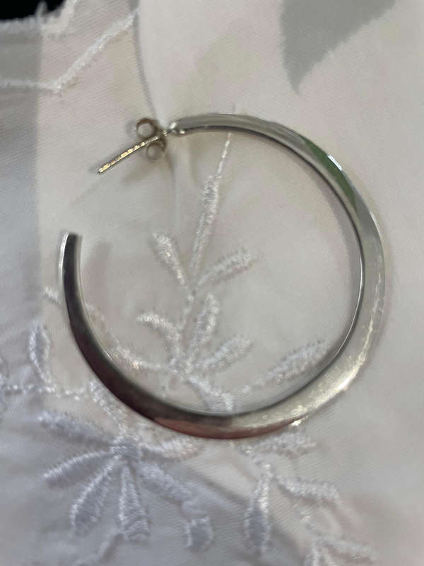 Beautiful Large Pair of Silpada Silver Hoop earrings 925 sterling silver. The studs as well!!