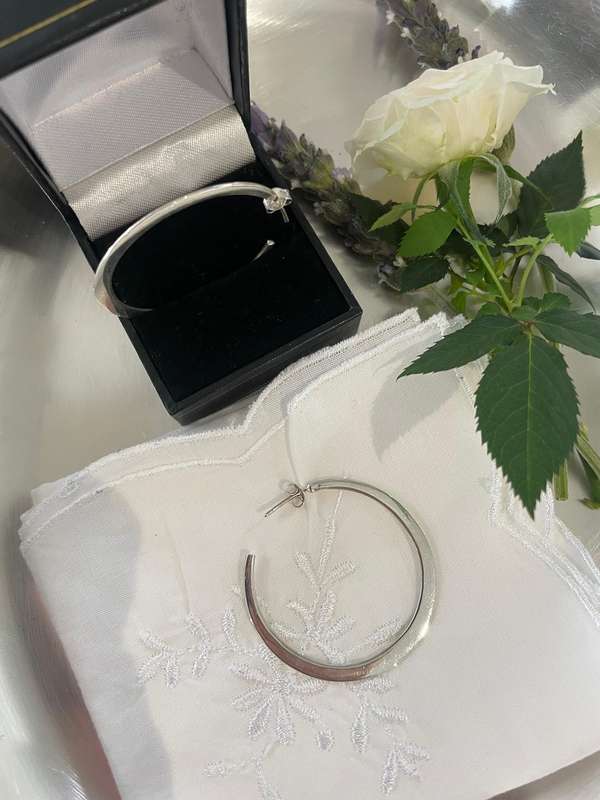 Beautiful Large Pair of Silpada Silver Hoop earrings 925 sterling silver. The studs as well!!