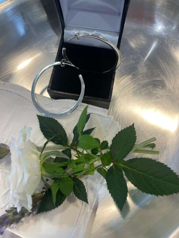Beautiful Large Pair of Silpada Silver Hoop earrings 925 sterling silver. The studs as well!!