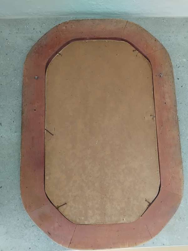 Antique octagon painted wooden frame with convex glass with portrait of a lady.