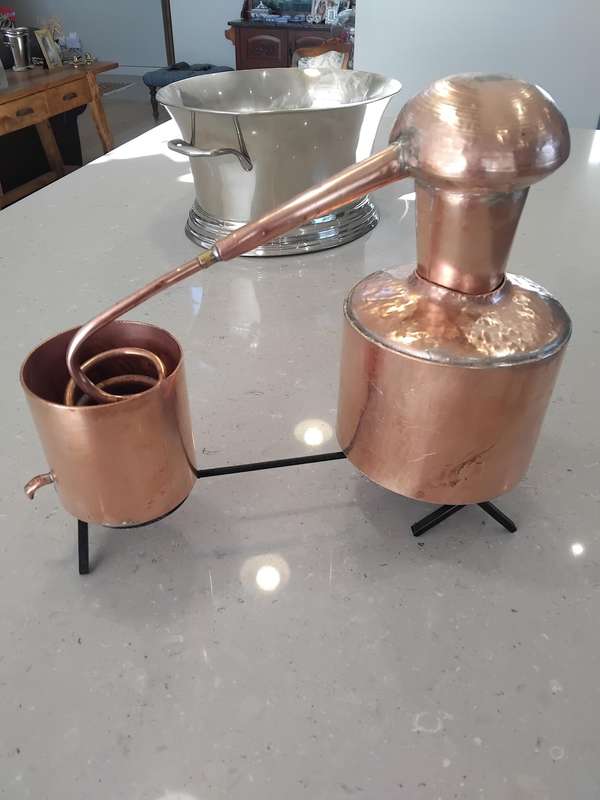 Extremely rare find! A solid copper moonshine still.