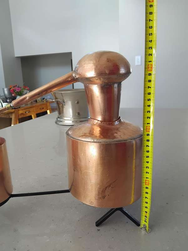 Extremely rare find! A solid copper moonshine still.