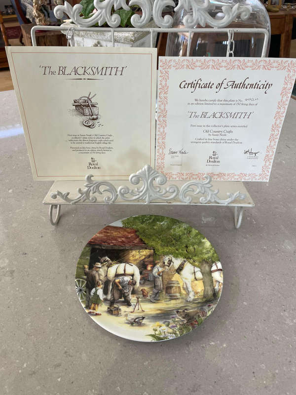 Royal Doulton "The BLACKSMITH" 1st issue by Susan Neale. Box, COA and leaflet.