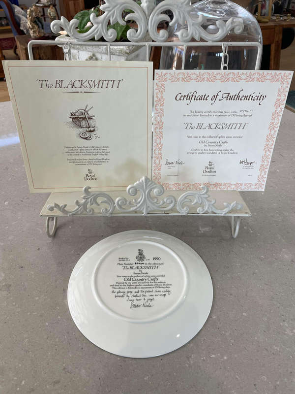 Royal Doulton "The BLACKSMITH" 1st issue by Susan Neale. Box, COA and leaflet.