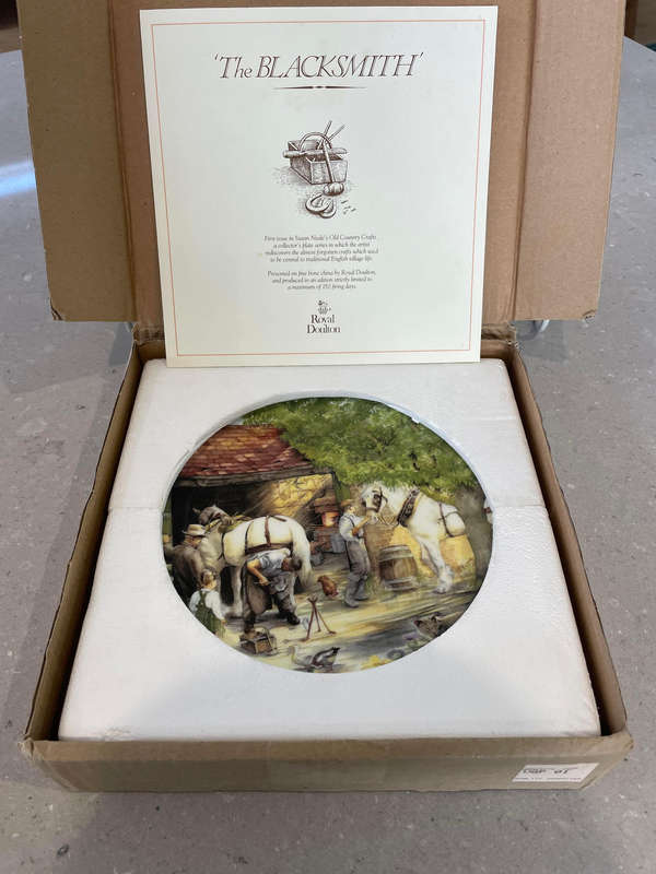 Royal Doulton "The BLACKSMITH" 1st issue by Susan Neale. Box, COA and leaflet.