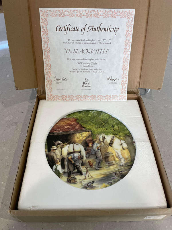 Royal Doulton "The BLACKSMITH" 1st issue by Susan Neale. Box, COA and leaflet.