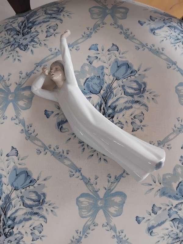 Vintage NAO Lladro "Yawing Girl" Figurine.