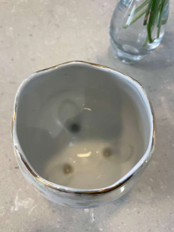 iridescent porcelain egg-shaped vase