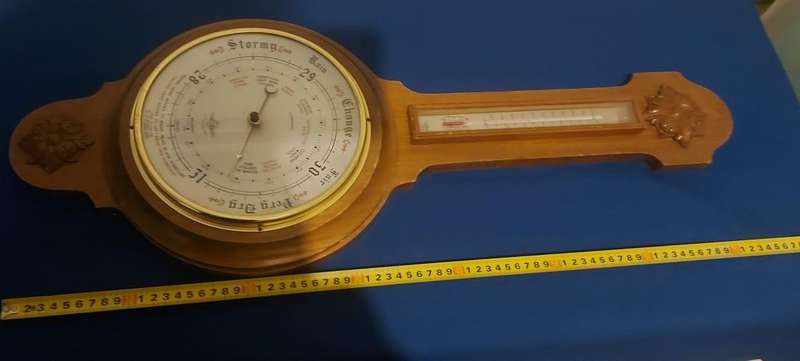 This vintage barometer thermometer