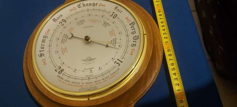 This vintage barometer thermometer