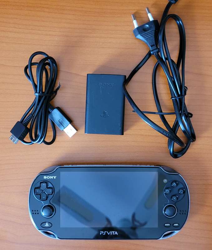 PS VIta PCH-1004 with OEM Charger and 8GB Memory Card