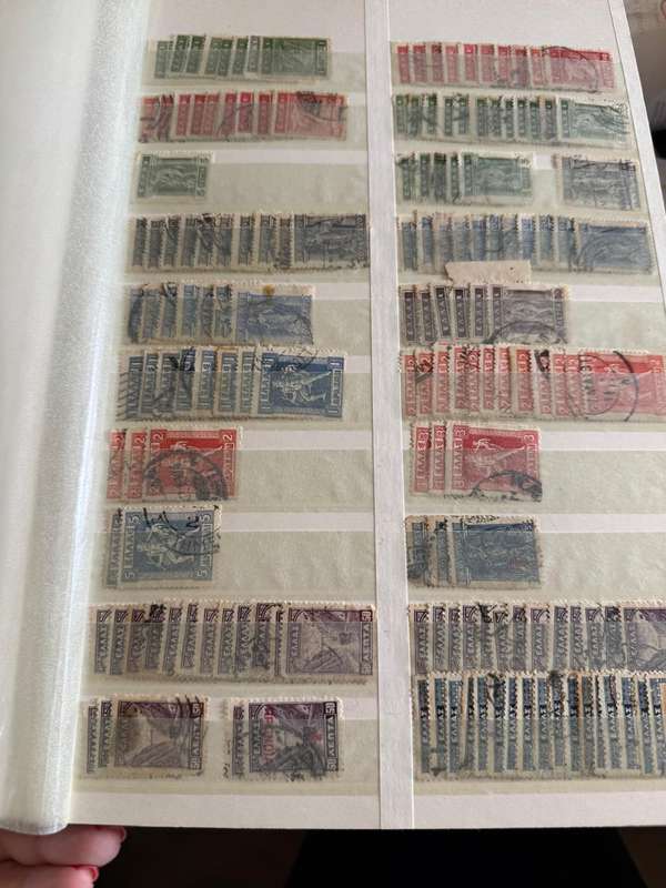 Greek stamps in album