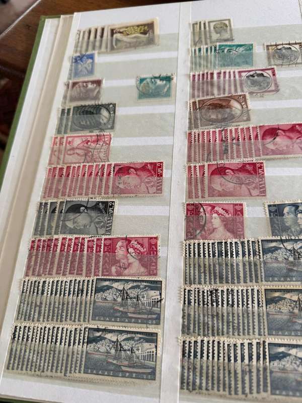 Greek stamps in album