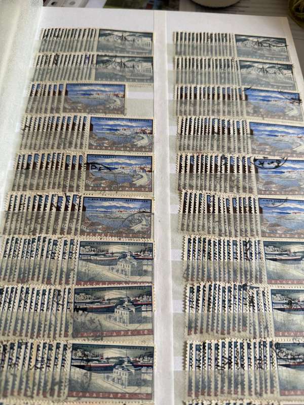 Greek stamps in album