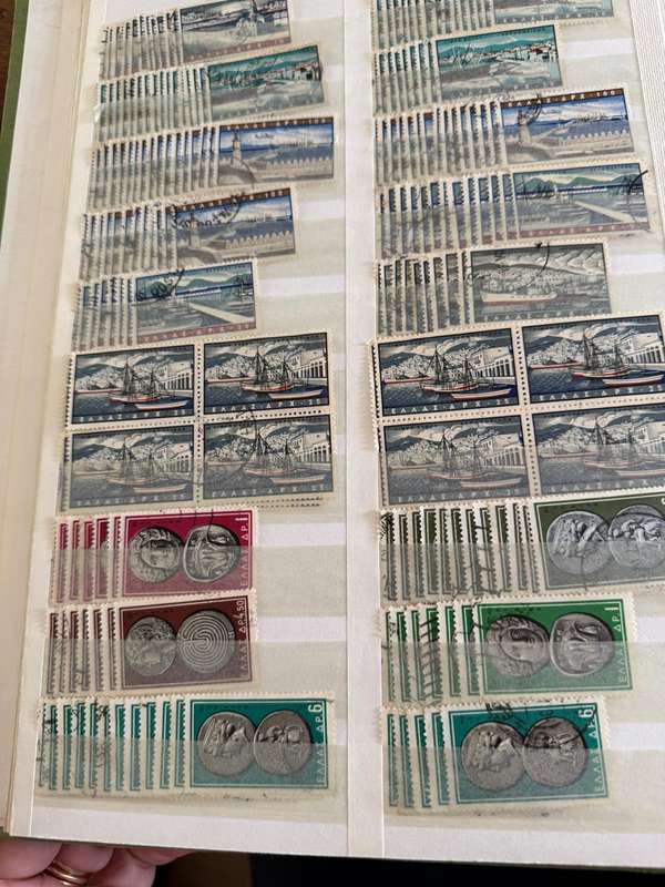 Greek stamps in album