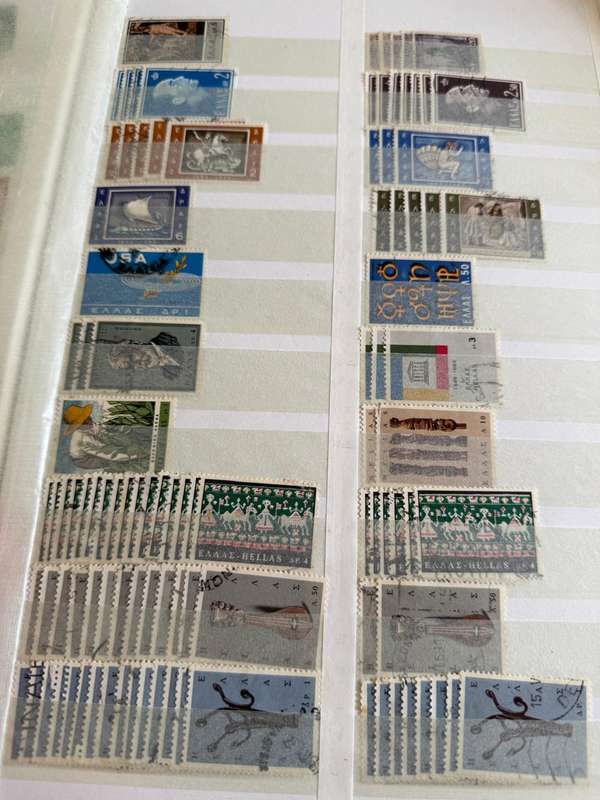 Greek stamps in album