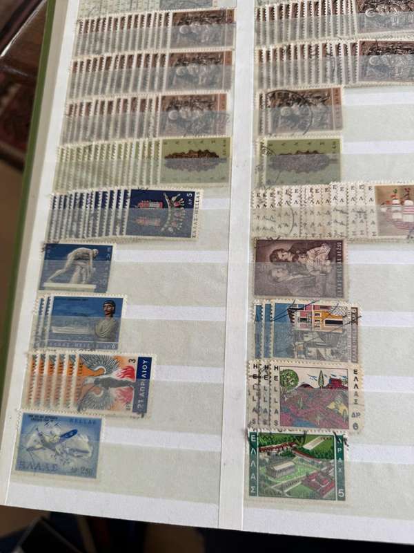 Greek stamps in album