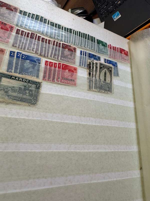 Malaysia,Switzerland ,Morocco, Kenya,Rwanda, Volta,Argentina Stamps in album
